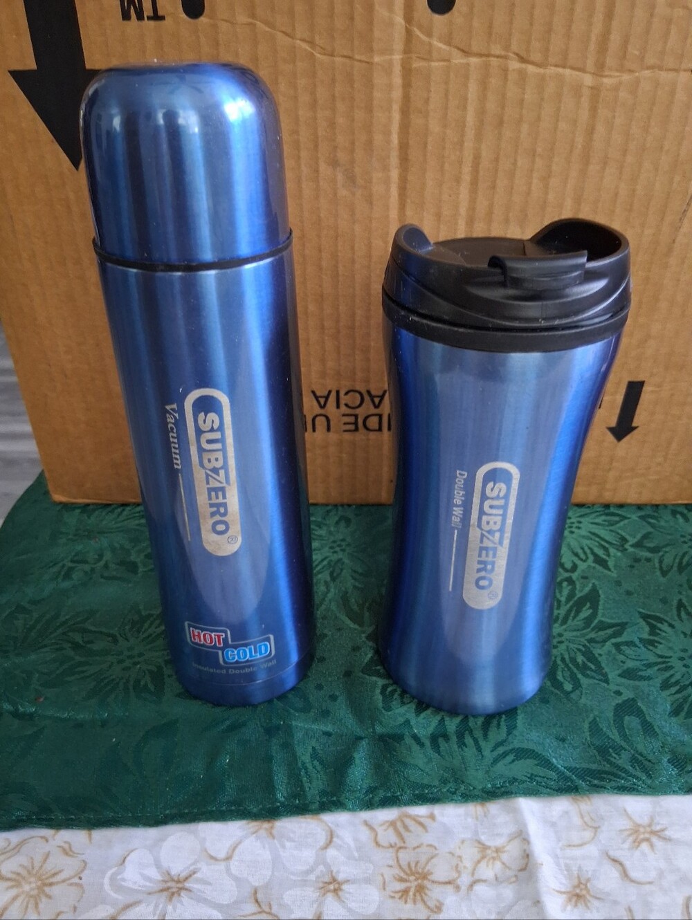 Blue Stainless Steel Thermos With Matching Mug.